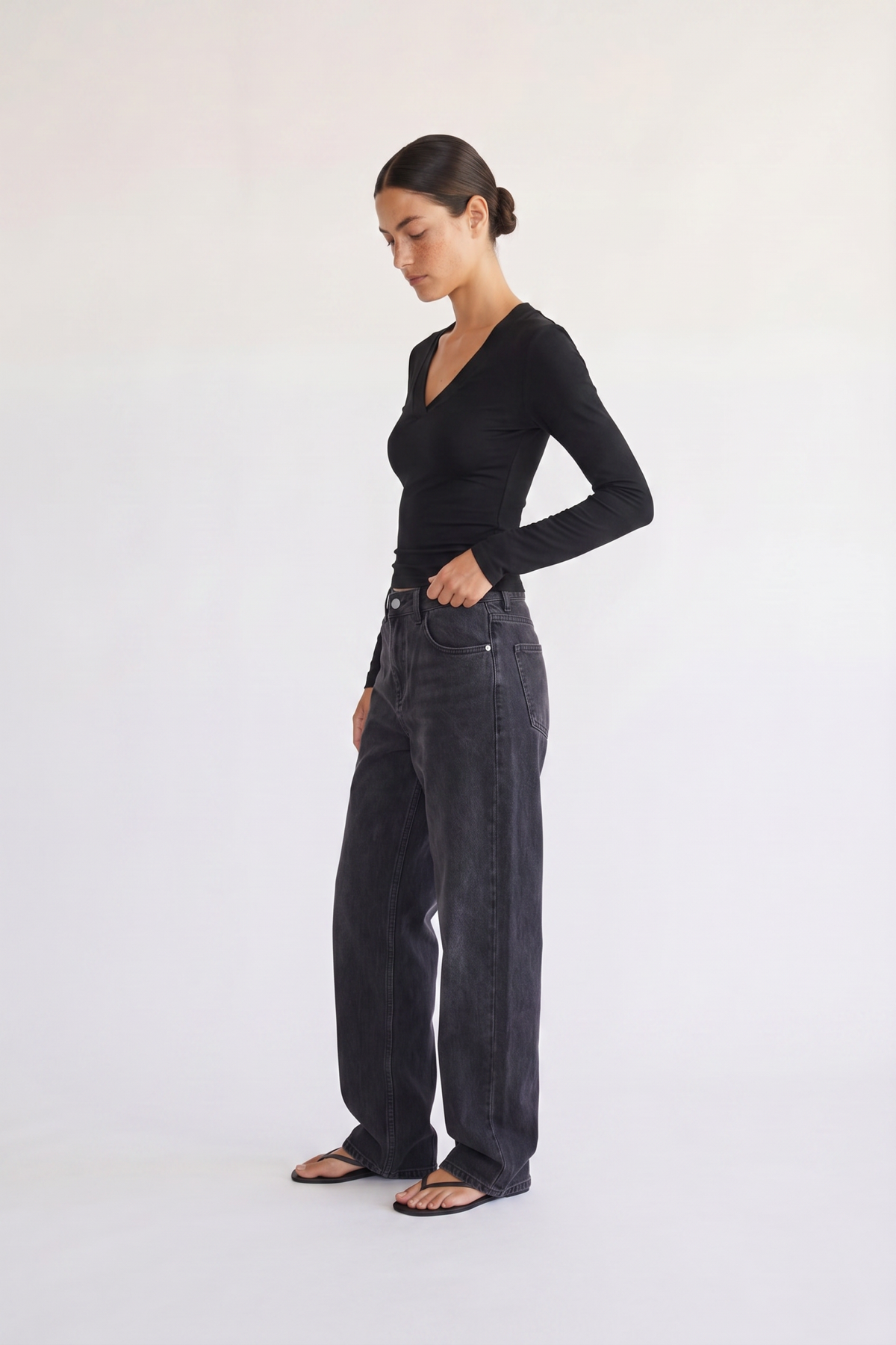 Model styling the Margaux black deep V henley top