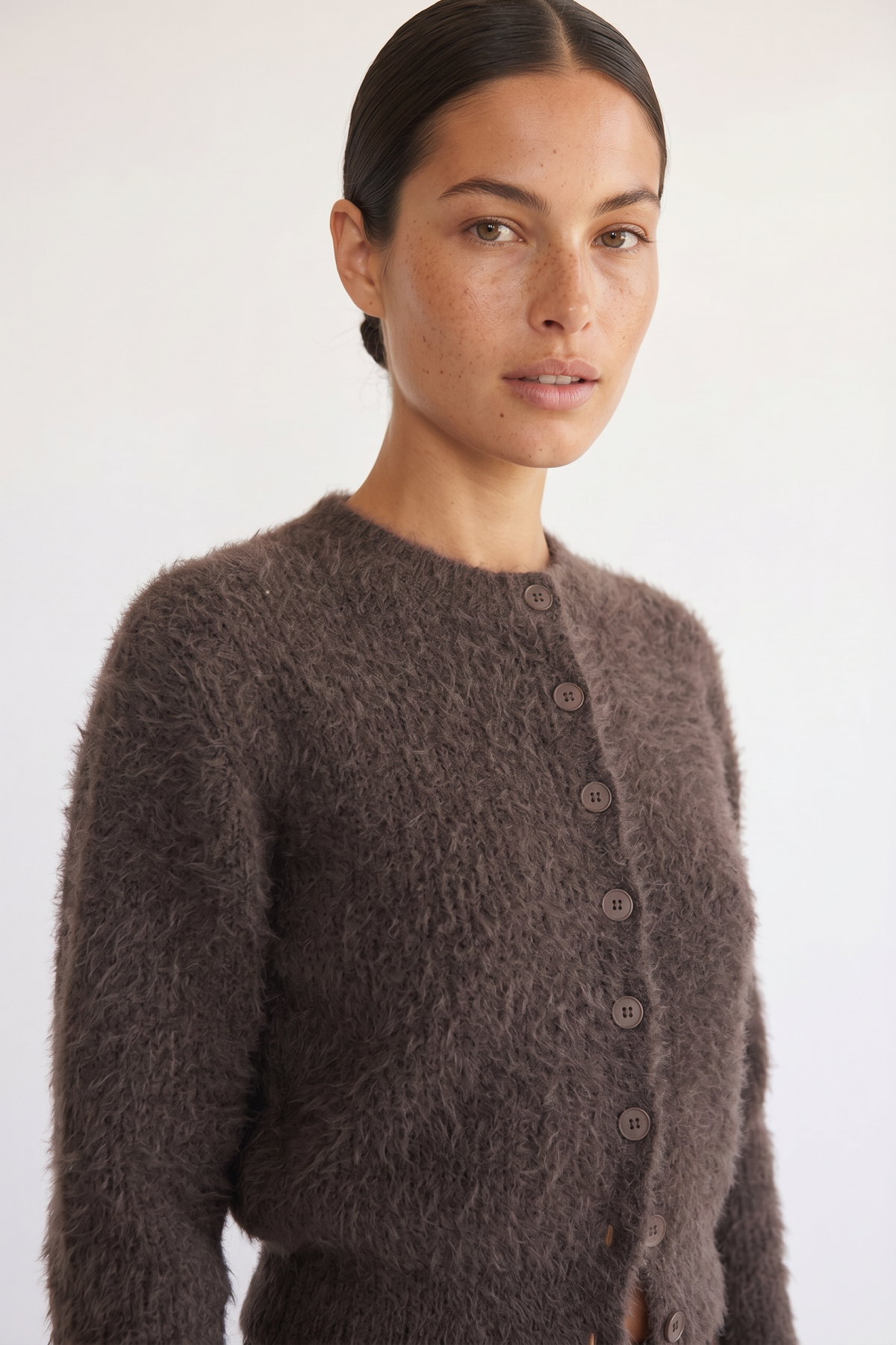 Back view of the Noor brown fluffy cropped cardigan