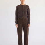 Woman wearing the Noor brown fluffy cropped cardigan, front view