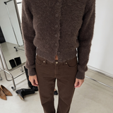 Model styling the Noor brown fluffy cropped cardigan