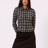 Model styling the Margot black check shirt