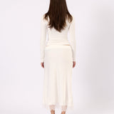 Model wearing the Noa Lace white lace top, close-up view
