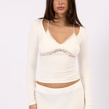 Model styling the Noa Lace white lace top