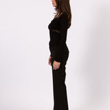 The Tailored Flare Pant in black, side view