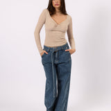 Back view of the Belted Wide Leg Jean blue wide leg jeans