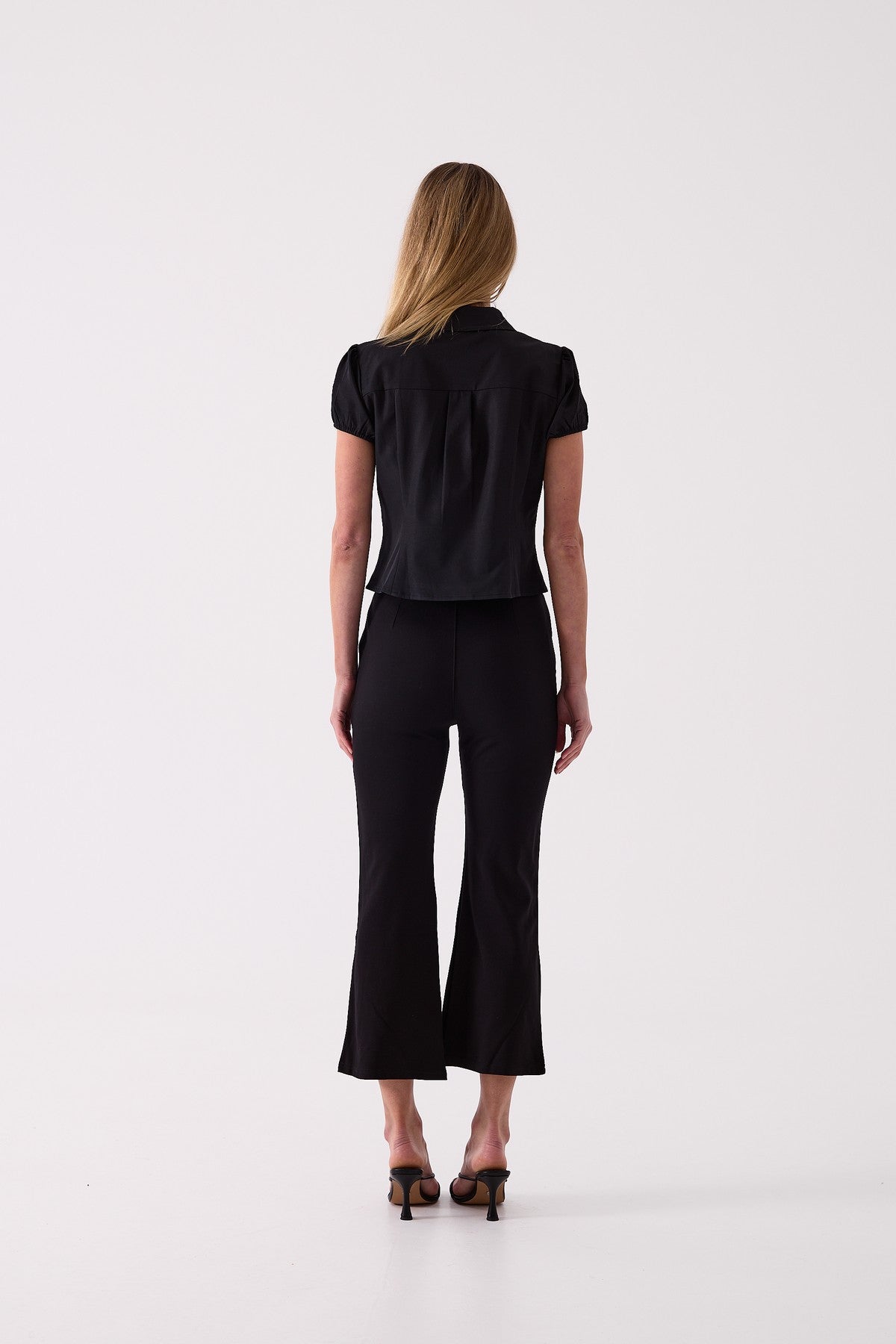 Camille Cropped Flare Pant in Black – back view