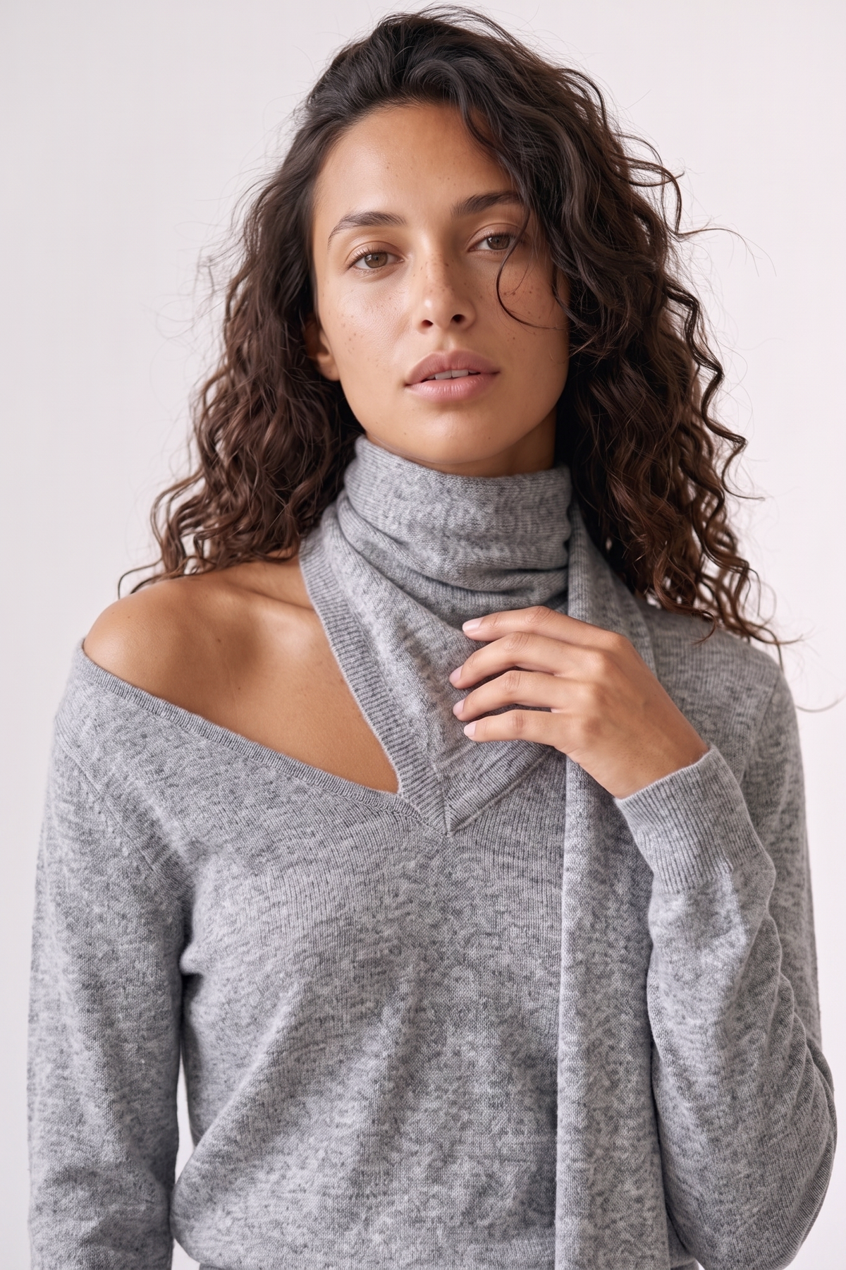 Wren Top in light grey — close-up of the knit fabric and draped scarf detail