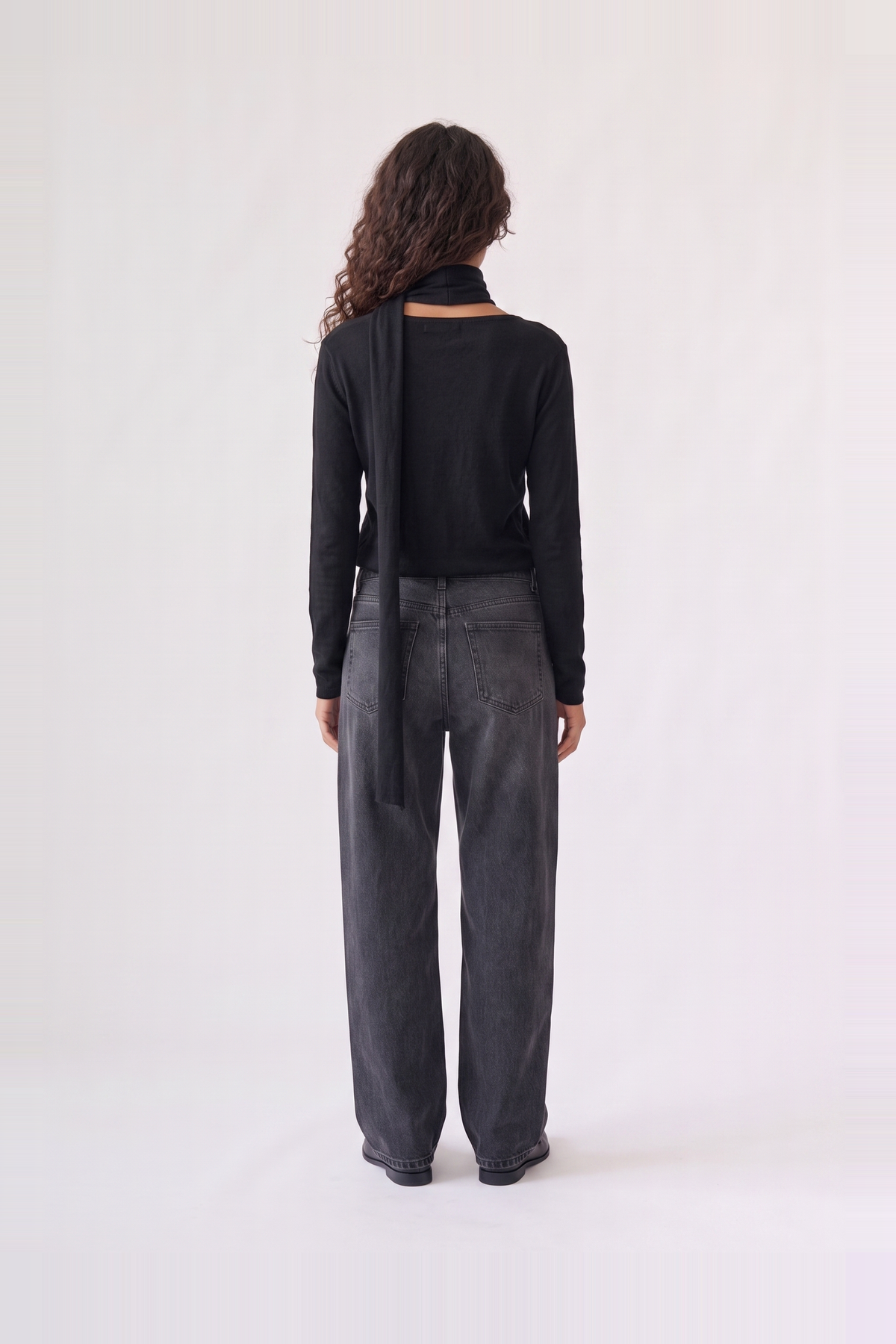 Wren Top in black — back view of the soft knit long-sleeve top
