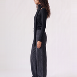 Wren Top in black — side view showing the draped scarf falling from the shoulder